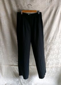 women pleated black trousers