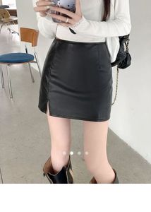 Black  Leather body hugging mini skirt