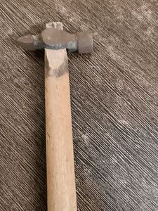 Hammer with wood stick