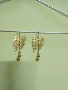 Ribbon Earrings In Gold Shade