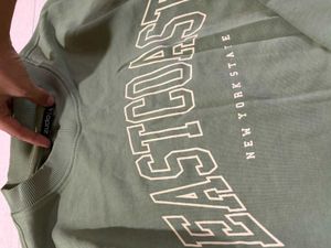 olive green sweatshirt