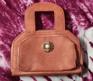 Chic Rose Gold Clutch with Pearl Accent