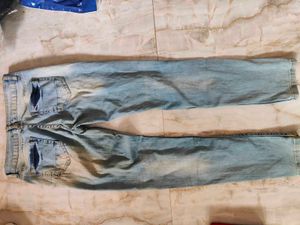 Ripped Light Wash Denim Jeans