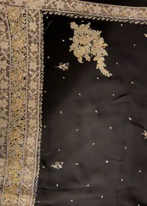 Elegant Black Saree with Intricate Embellishments