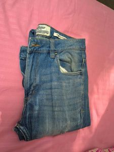 Distressed Denim Jeans
