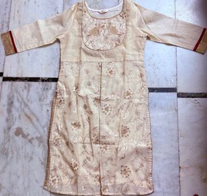 Cream embroidered Kurta with Red Zari Skirt