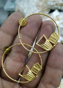 Unique Gold Tone Hoop Earrings