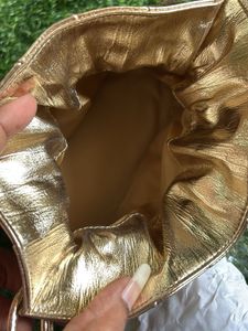 Estee Lauder Glamorous Gold Potli  Bag