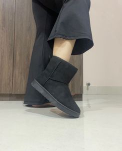 Truffle Collection Mid-Calf Length Fur Boots