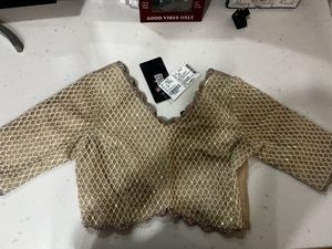 Elegant Gold Embellished Blouse