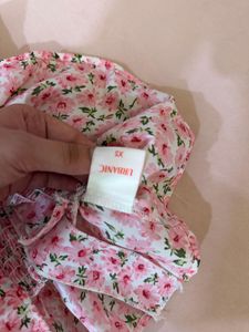Women’s Pink Floral Smocked Peplum Top