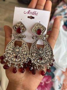 Oxidized Silver Jhumka Earrings with Red Stones