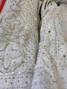 Elegant White Embellished Lehenga Choli