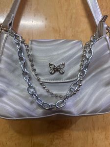 silver shoulder bag