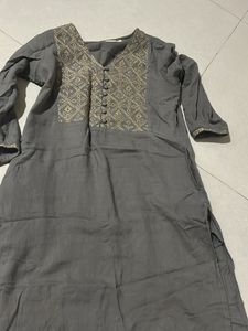 Elegant Grey Kurta with Intricate Gold Embroidery
