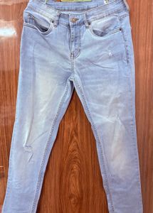 Light Wash Denim Ripped Jeans