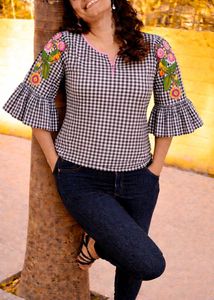 Chic Black & White Checkered Top with Floral Sleev