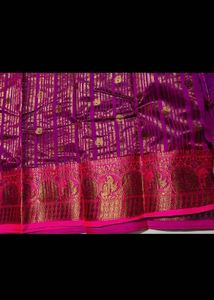 Stunning Teal Saree with Pink Border