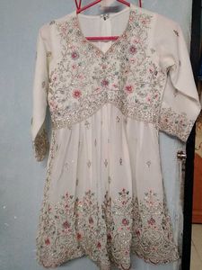 Farashi sharara and peplum top fully embroidered.