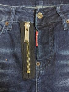 Stylish Dark Wash Jeans with Unique Embellishments