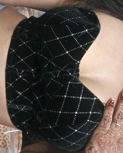 Black geometric tube neck corset top