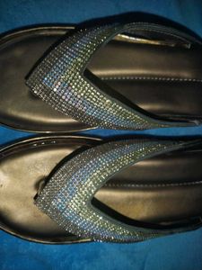elegant gold sandle with silver and golden stone