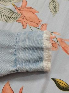 Denim Jacket with Frayed Edges
