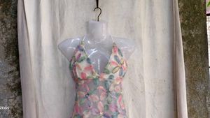 69. Sheer Floral Applique Halter Top
