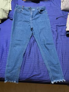 Blue Denim Jeans with Frayed Hem