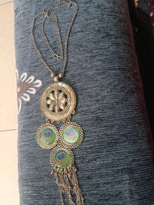 oxidised silver long necklace with peacock feather