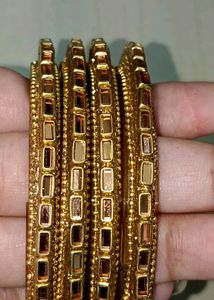 Elegant Gold Bangles with Embellishments