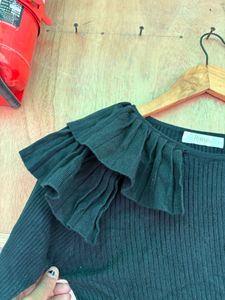 Chic Black Ribbed Top with Ruffle Detail