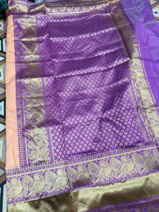 Elegant Peach Saree with Peacock Border