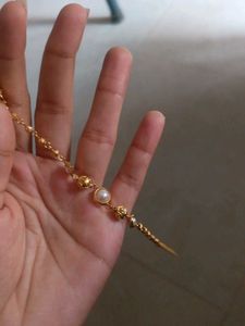 Elegant Gold Bracelet with Pearls