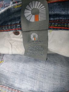 Stylish Blue Denim Jeans with Yellow Accents