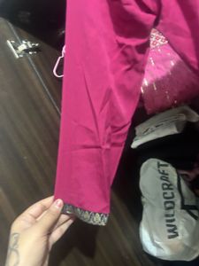 Vibrant Pink Kurta Set with Embellished Neckline