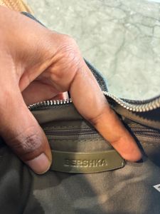 Bershka buckle detail denim crossbody bag in dirty