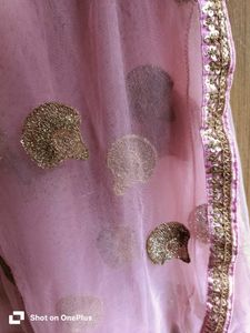 Pink net saree with sequin zari motifs