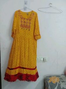 Yellow Kurta with Red Border,slightly used
