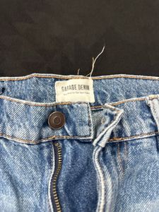 Distressed Blue Denim Jeans