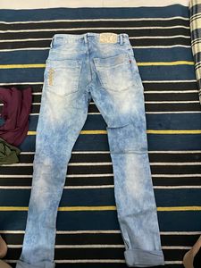 Light Wash Ripped Jeans