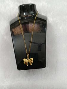 Gold Bow Pendant Necklace