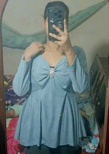 Blue Peplum paded .Top with Long Sleeves