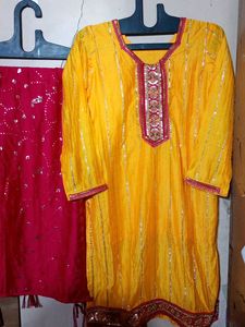 yellow and pink heavy sharara suit with