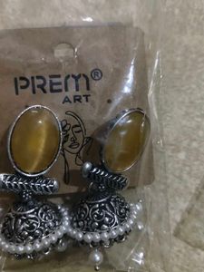 Elegant Jhumka Earrings with Green Stone