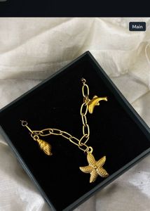 Gold Charm Bracelet - Starfish & Dolphin