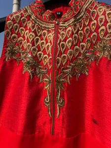 Red Embroidered Sleeveless Kurta.