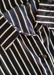 Chic Striped Button-Up Dress with Floral Accent