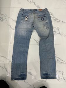 Light Wash Distressed Denim Jeans