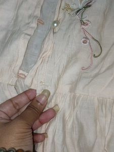 Embroidered peach Peplum top